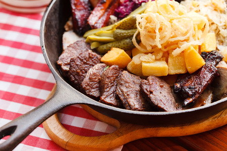 pan with grilled meatの写真素材