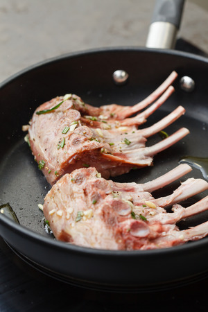 lamb chops on the panの写真素材