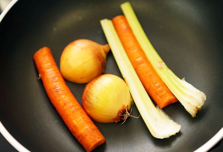 roasted vegetables for brothの写真素材