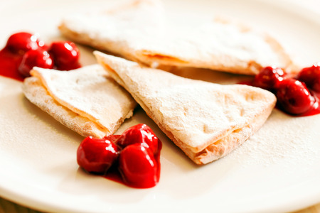 pancakes with cherryの写真素材