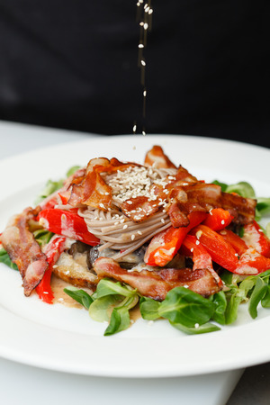 warm salad with noodle and baconの写真素材