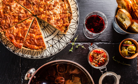 Spanish dinner cooked and served on the tableの写真素材