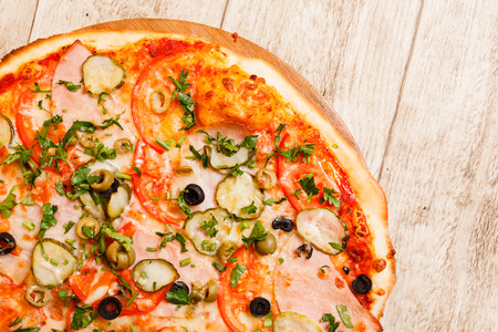 pizza on the wood backgroundの写真素材