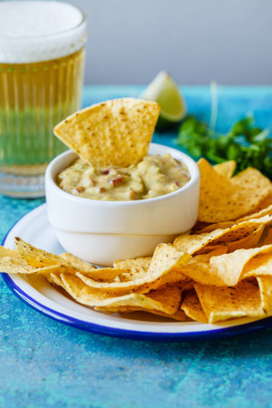 Guacamole with avocado lime tomato and cilantroの写真素材