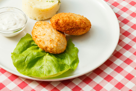 chicken cutlet with mashed potatoesの写真素材