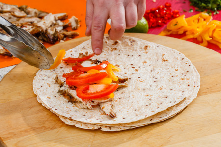 chef making tortillaの写真素材