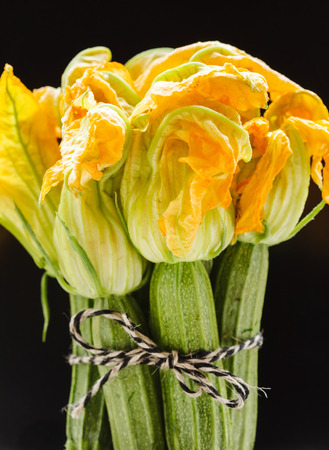 fresh zucchini flowersの写真素材