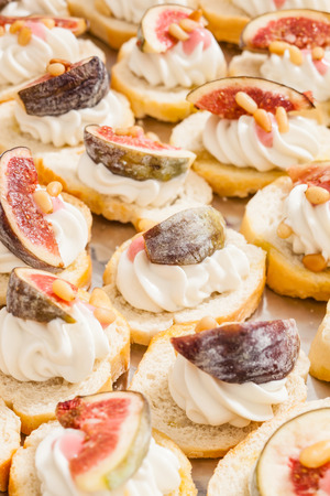 canape with cream cheese and figの写真素材