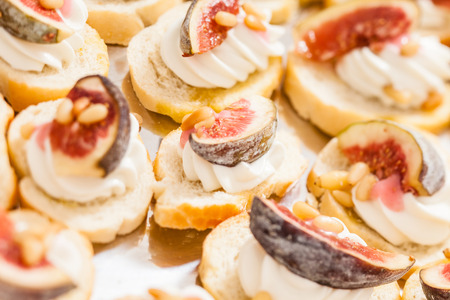 canape with cream cheese and figの写真素材