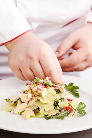 chef making saladの写真素材