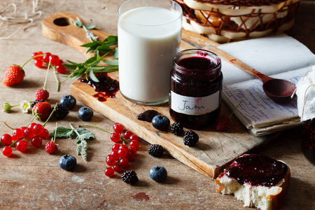 Berries jam on the tableの写真素材