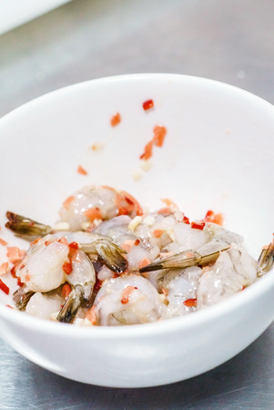 raw prawns with spiceの写真素材
