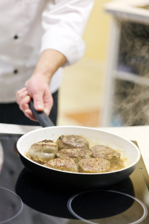 Meat frayed on fraying panの写真素材