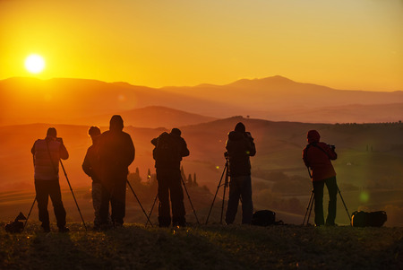 Silhouette of a landscape photographersの写真素材