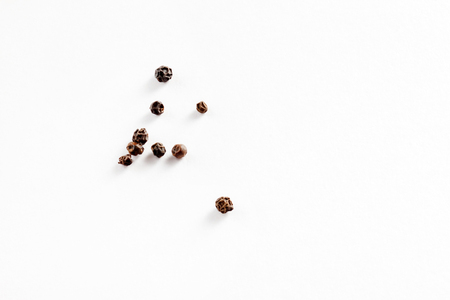 black peppers on the whiteの写真素材