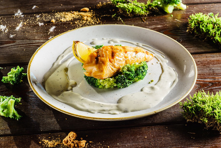 salmon steak with broccoliの写真素材