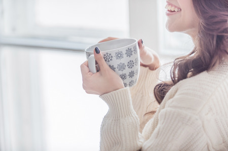 women with cup of coffeeの写真素材