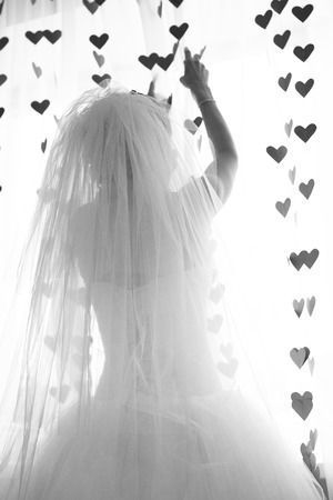 bride near windowの写真素材