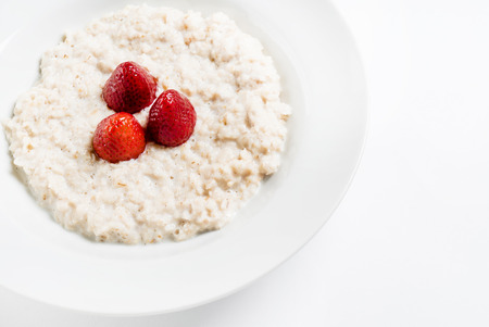 oat porridge with strawberryの写真素材
