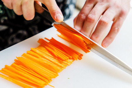chef cutting vegetablesの写真素材