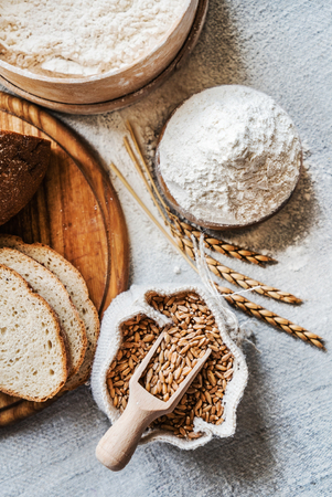 wheat and flour on the tableの写真素材