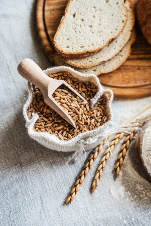 wheat and flour on the tableの写真素材