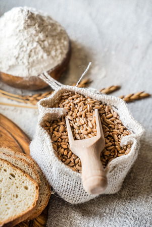 wheat and flour on the tableの写真素材