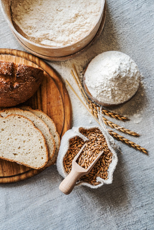 wheat and flour on the tableの写真素材