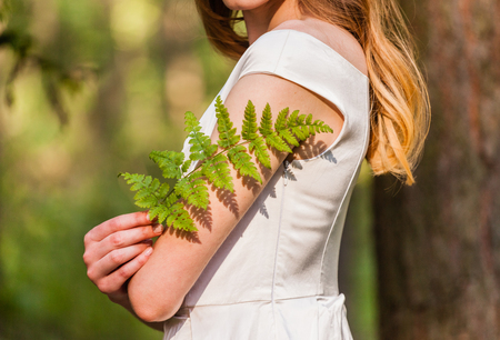women with fernの写真素材