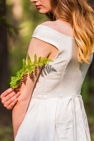 women with fernの写真素材