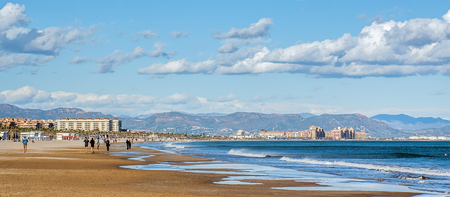 VALENCIA, SPAIN - DECEMBER 28, 2015: Aerial view of the city beach with tourists and locals resting at the shore.のeditorial素材