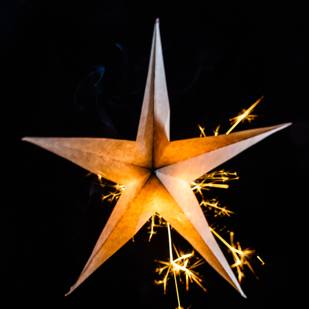 holiday star on black backgroundの写真素材