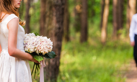 Beautiful bride with flowersの写真素材