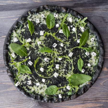 pizza with black caviarの写真素材
