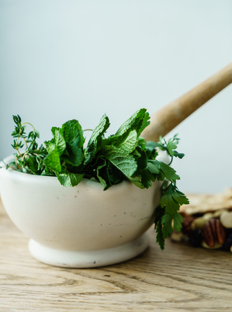 mortar with fresh herbsの写真素材