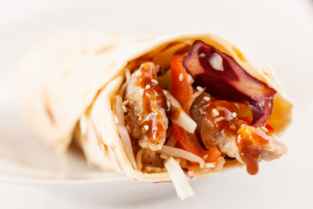 tortilla fajita wraps with meat and vegetablesの写真素材