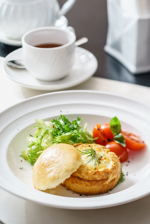 eggs benedict with fresh saladの写真素材