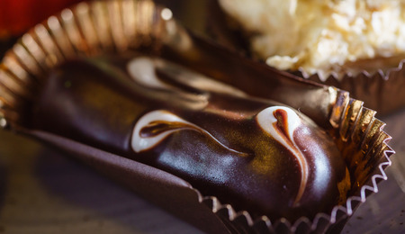 eclair with chocolate icingの写真素材