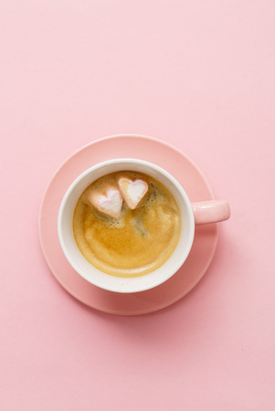 coffee with marshmallow heartsの写真素材