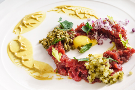 beef tartar with eggの写真素材