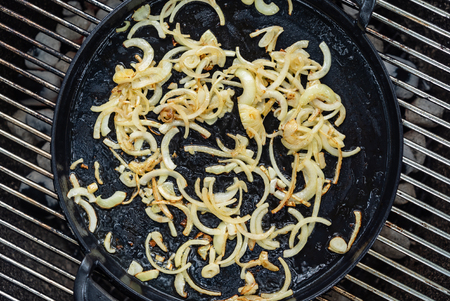 chef frying onionの写真素材