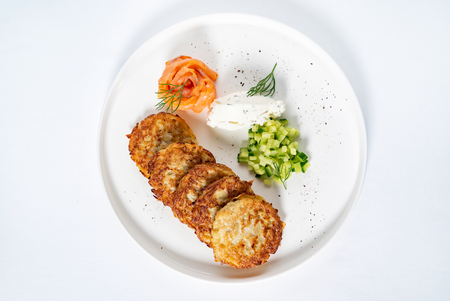 potato pancakes with salmonの写真素材