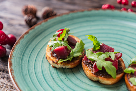 Christmas canape with duckの写真素材