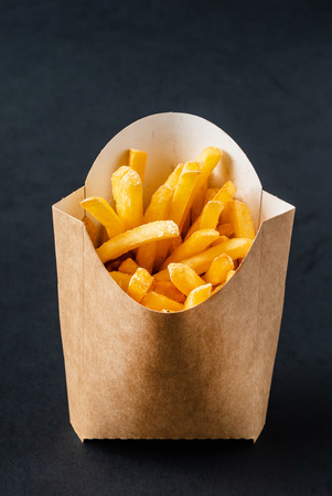french fries on black backgroundの写真素材