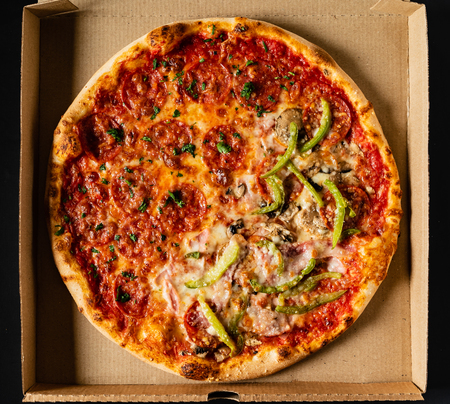 pizza on the black backgroundの写真素材