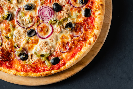 pizza on the black backgroundの写真素材