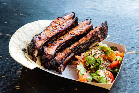 grilled ribs and salad