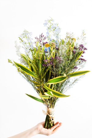 Nice spring flower bouquet on the whiteの写真素材