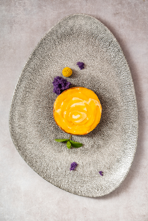 Fresh fruit tart with peach and mangoの写真素材