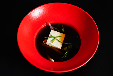 vegan soup with tofu, broccoli, carrot and green beansの写真素材